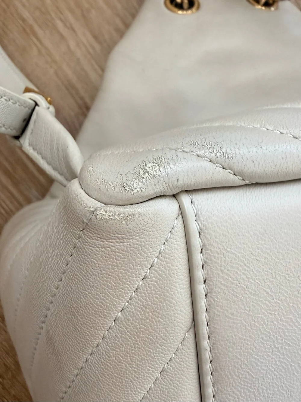 Saint Laurent Off-White Quilted Leather Backpack with Gold YSL Logo